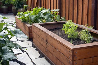 Raised beds can be attractive features in a client’s garden that produces a bounty of edible plants. Photo: Humboldt Redwood Company