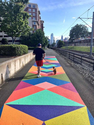 Other portions of the Rail Trail feature art installations like the Magic Carpet murals. Photo: Charlotte Rail Trail