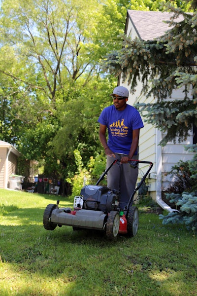 Rodney Smith Jr. mowing the first lawn of the day. Photo: Briggs & Stratton