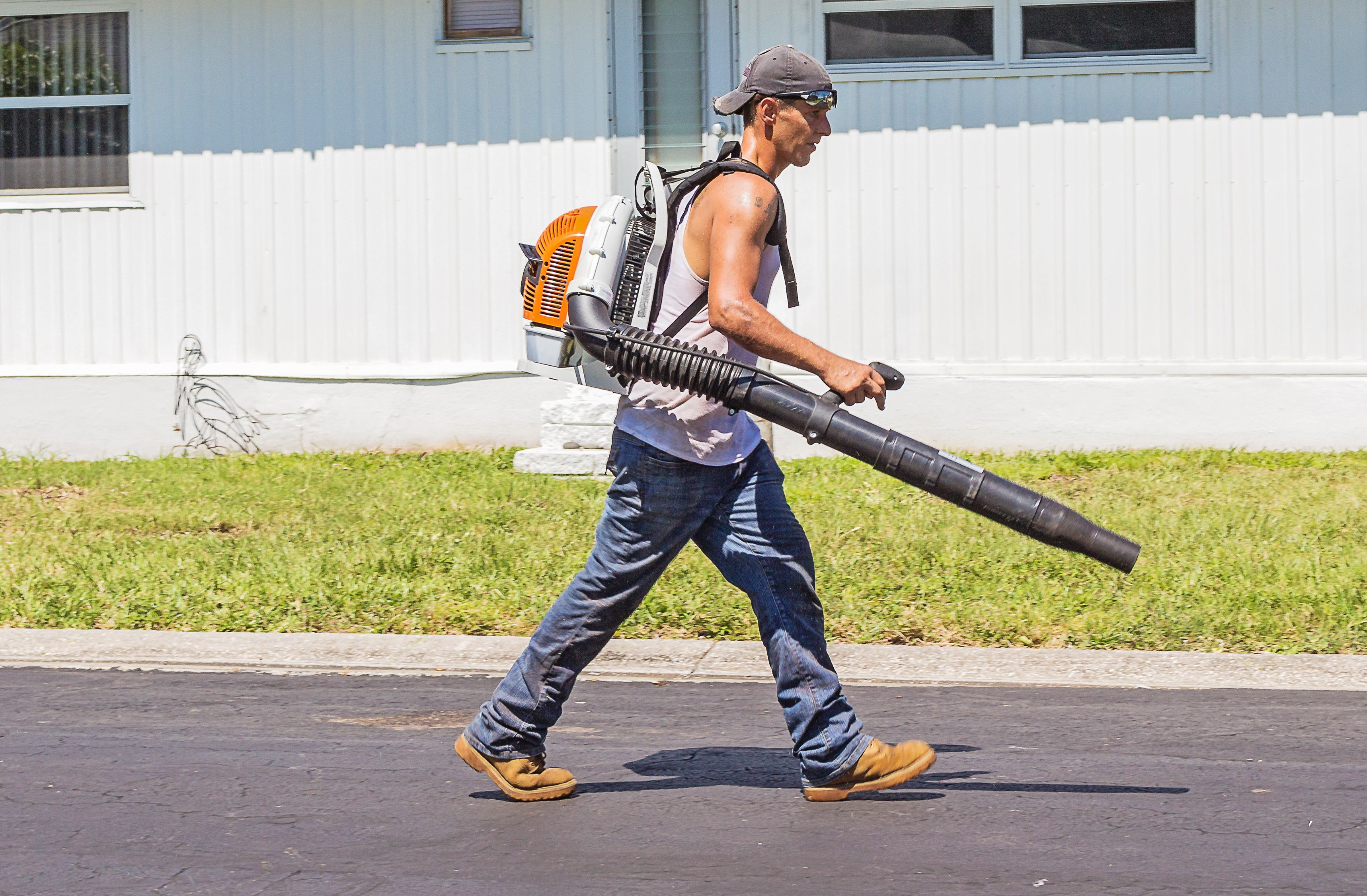 gardener-worker-leaf-blower