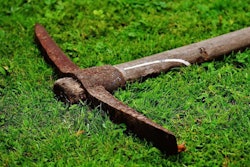 pickaxe-in-grass