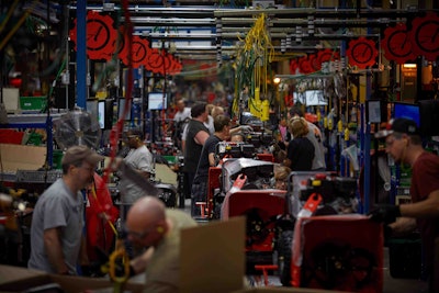 Employees are able to move around to different stations as needed depending on the work loads. Photo: Ariens