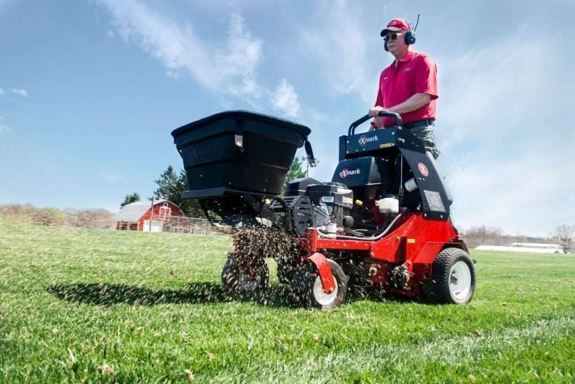 Exmark shows off spreader attachment for stand on aerator Total