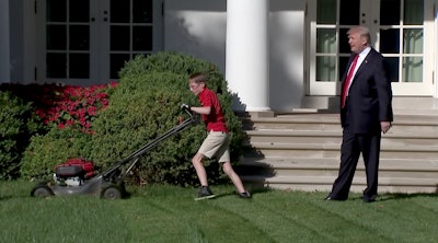 Frank was so focused on mowing he didn’t notice the president at first.