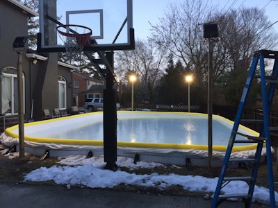 Customers can extend the use of their rink by having outdoor lighting installed. Photo: Berns Landscaping Services, Inc.