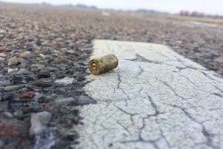 bullet-casing-in-road