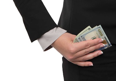 woman with money behind back