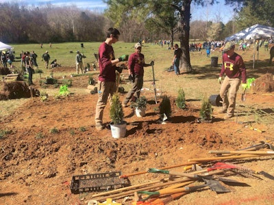 The County College of Morris team decided to divide and conquer the landscape plant installation. Photo: Jill Odom