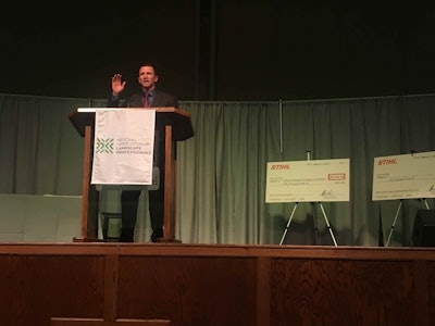 Kory Beidler passed the roll of chairman of NCLC on to Doug Halsey with Ruppert Landscape. Photo: Jill Odom