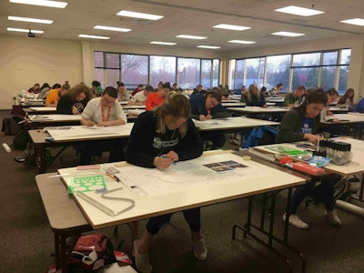 Students work from a base plan during the exterior landscape design event. Photo: Jill Odom