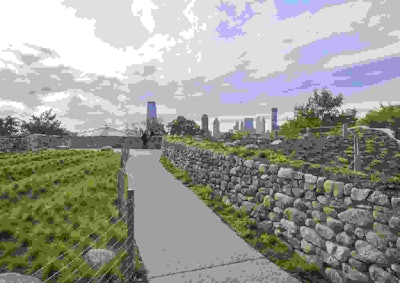 The 96′ x 170′ Memorial winds through a rural Irish landscape, with paths carved into a hill thickly lined with native Irish plants and stones imported from each of Ireland’s 32 counties. Photo: Edward Menashy