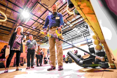 Ryobi’s string trimmer can change attachment heads. Photo: Scott Rokis