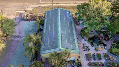 An aerial view of the newly installed solar panels on Earth Works’ garden center. Photo: Earth Works