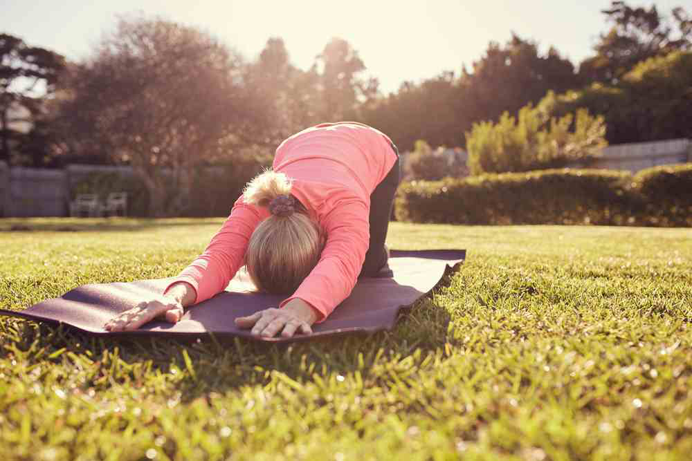 lady-doing-yoga-outside