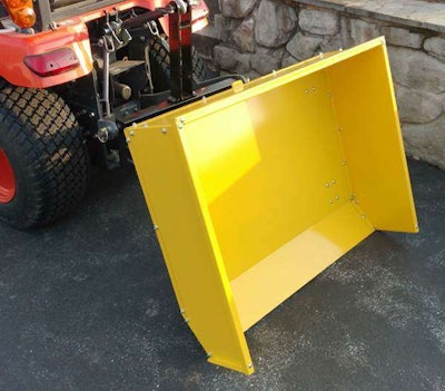 Photo of Yellow 3 point dump cart attachment manufactured by Earth and Turf