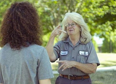 Pictured is Charlotte Wittington interacting with students at Troy University. Photo: Tropolitan