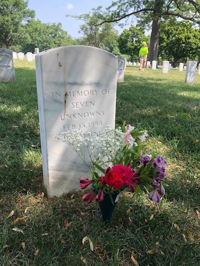 Children left bouquets for unknown victims of the USS Maine. Photo: Jill Odom