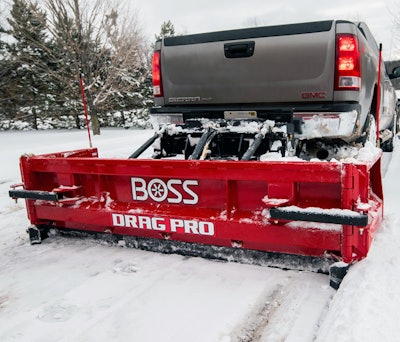 Some landscapers opt to use both front and rear plows on their trucks. Photo: Boss Snowplow