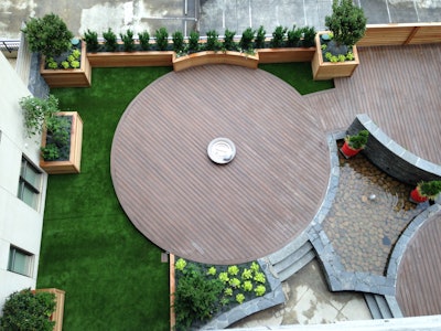 Artificial turf can work well in spaces where natural turfgrass isn’t practical, like on the seventh floor of an apartment building. Photo: Bennett Design & Landscape