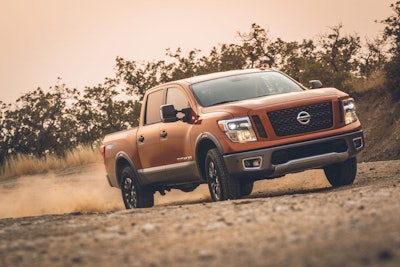 Titan truck riding on dirt road