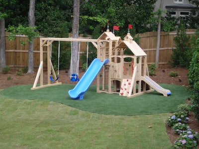 One popular use for artificial turf is for children play areas. Photo: Bennett Design & Landscape