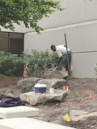 One of Eichenlaub’s H-2B workers digs a trench for an irrigation system. Photo: Eichenlaub, Inc.