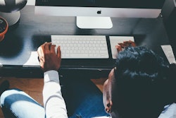 guy-using-desktop-computer