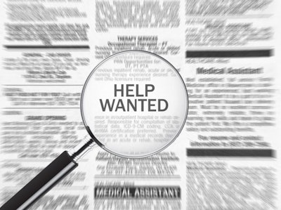 Magnifying glass focusing on Help Wanted