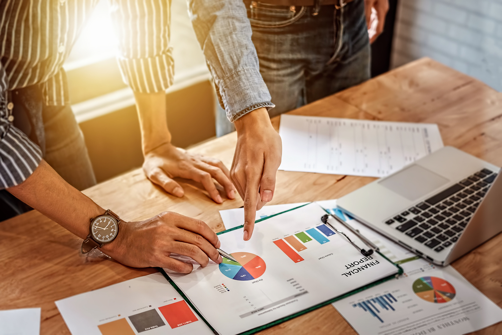 employees-looking-at-charts