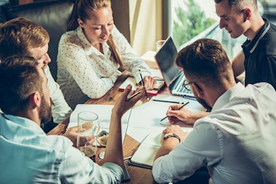 People working together around a table