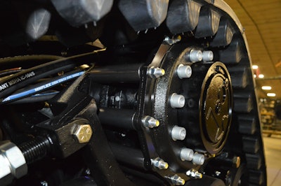 Rollers rather than gear teeth, drive the track lugs forward, reducing friction and improving the undercarriage life.