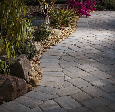 The soldier course is likely the most-used laying pattern for a paver border. Photo: Belgard