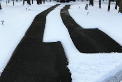 WarmlyYours Heated Tire Tracks in Driveway in Action