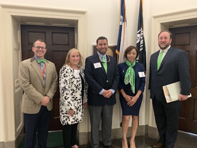 Pictured are, from left to right, Tim Little, Ewing Irrigation and Landscape Supply; Amy Graham; Stuart Morris; Kiara Daniel; and Ryan Skrobarczyk, director of legislative and regulatory affairs with TNLA. Photo: Beth Hyatt/Total Landscape Care