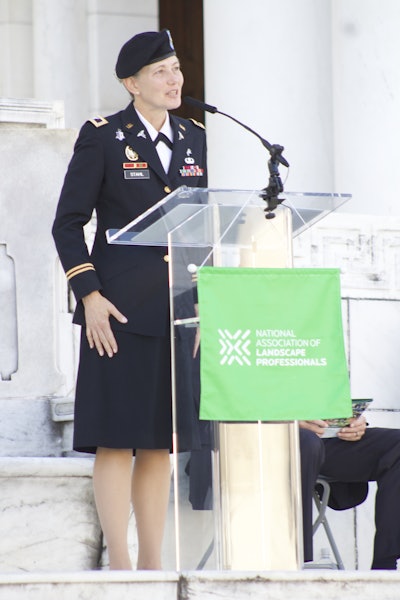 Retired Colonel Andrea Stahl addresses the attendees of Renewal & Remembrance. Photo: Beth Hyatt/Total Landscape Care