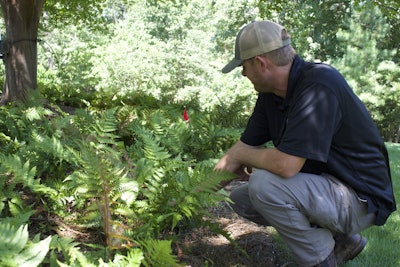 Jonathan Deweese, installation field manager, makes his rounds checking up on project sites. Photo: Beth Hyatt/Total Landscape Care