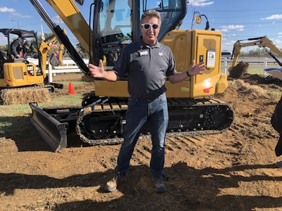 Greg Worley shares the 306 CR’s specs. Photo: Jill Odom/Total Landscape Care