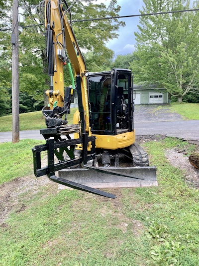 Doyle says the tiltrotator frees up an extra worker so they can focus on other tasks. Photo: Innovative Lawn & Landscape