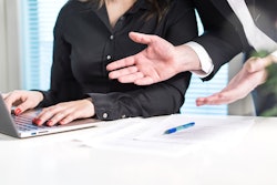 person-being-criticized-at-desk