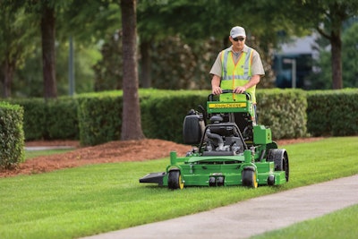 Stand-on mowers also help save time as they are easier to get on and off when removing debris. Photo: John Deere