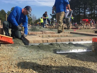 Teams hustled to complete their hardscape installations. Photo: Jill Odom/Total Landscape Care