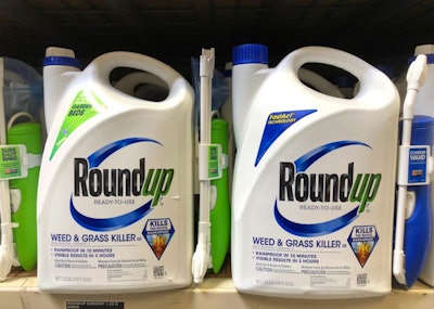 Bottles of Roundup weed and grass killer on a shelf