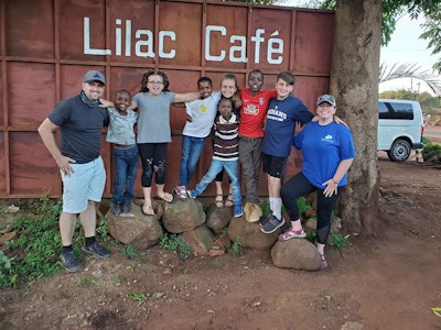 Brockelbank, far left, often travels on missions to countries like Tanzania. Photo: MetroGreenscape