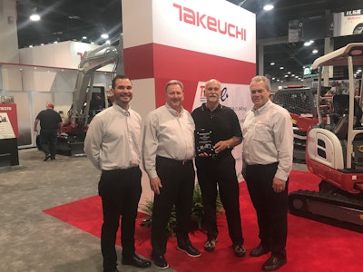 Pictured are, from left to right, Robert Vistad, Takeuchi west region regional business manager; Hampton Wideman; Randy Cram; and Henry Lawson, Takeuchi director of sales. Photo: Takeuchi