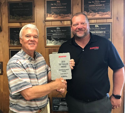 Chris Shoots (right) presents Jim Anderson (left), of Anderson Machinery, with a Gehl 2019 Top Dealer Award. Photo: Manitou Group