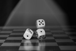 dice-roll-onto-checkerboard