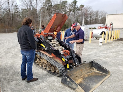 When interning at Myatt, students learned to perform a safety check on equipment. Photo: Myatt Landscaping