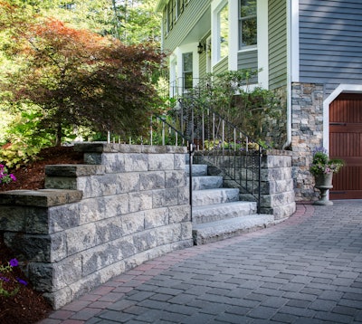 driveway with hardscape retention wall and stairs
