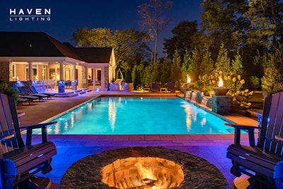 haven lighting's outdoor lighting around patio with swimming pool and firepit