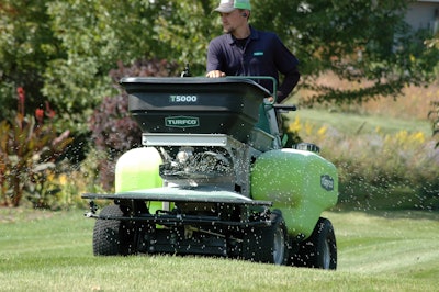 A Turfco T500 spreader/sprayer being used to spread grass seed